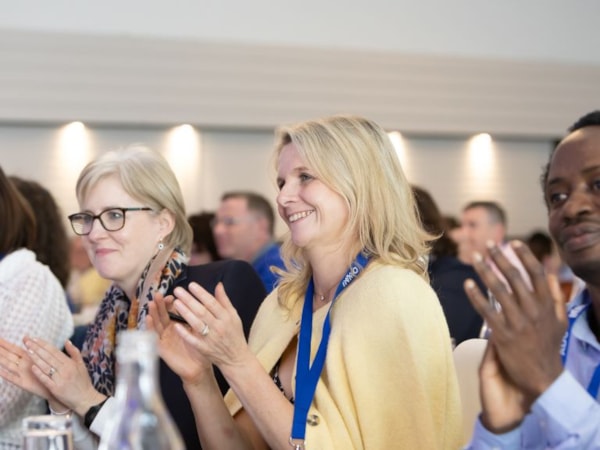Members clapping at ADC 2025